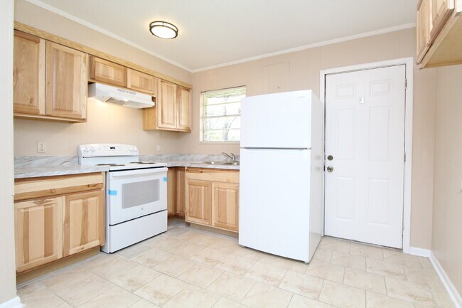 Building Photo - Updated 2BR/1BA Milton Triplex Unit Near Hwy 90 with Tile Flooring, Modern Bath Updates & Voucher...