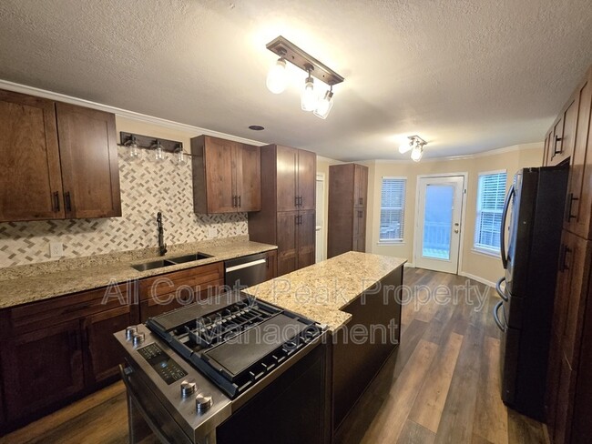 Foto del edificio - 8616 River Cove Dr