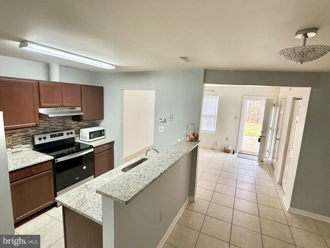 Building Photo - 10128 Reprise Dr