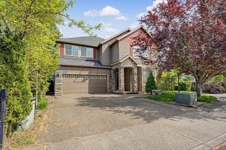 Building Photo - 132 NE 63rd Ave