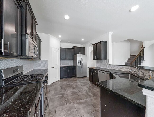 Building Photo - 4 br, 3.5 bath House - 22418 Mary Rogers T...