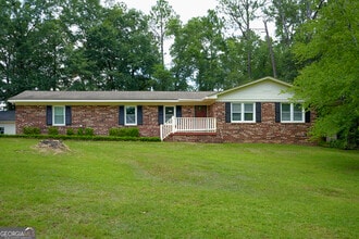 Building Photo - 307 Pinewood Dr