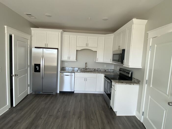 Primary Photo - NEW CONSTRUCTION CONDO