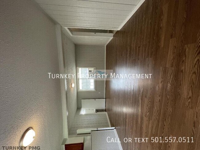 Building Photo - charming 2-bedroom, 1-bathroom home offers...