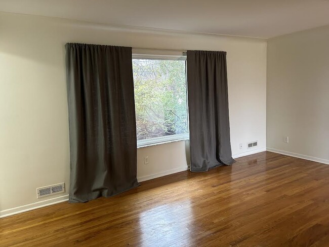 Living Room Window & Hardwood Floor - 5192 Center Rd