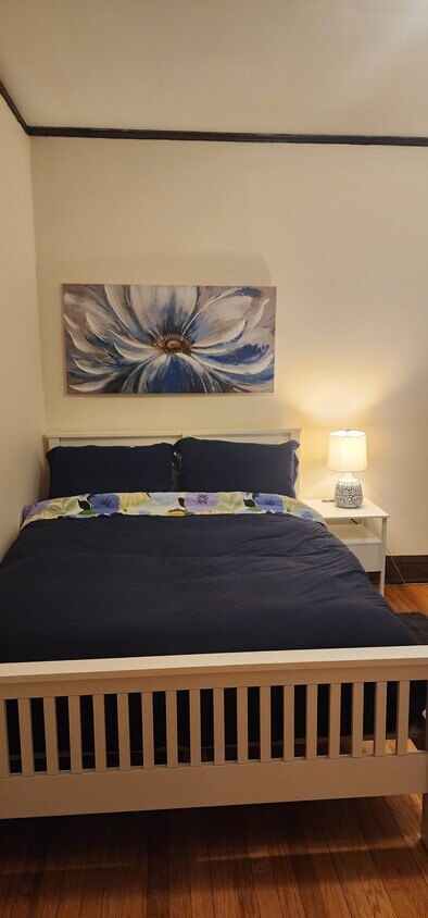 Bedroom with queen bed, dresser, two nightstands, two lamps and two closets - 2018 Lake St