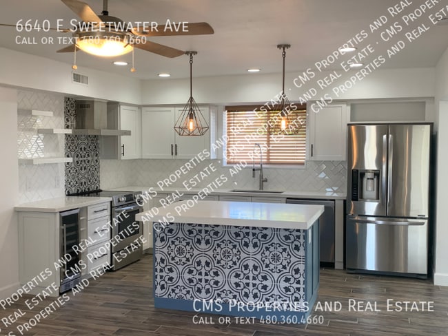 Building Photo - 6640 E Sweetwater Ave