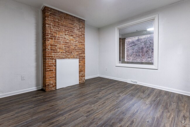 Building Photo - AVAILABLE APRIL - Open Concept 3 Bedroom Home w/ Character Throughout!