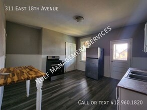 Building Photo - 311 E 18th Ave