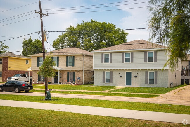 You can find larger residences sharing narrow lots in Behrman.