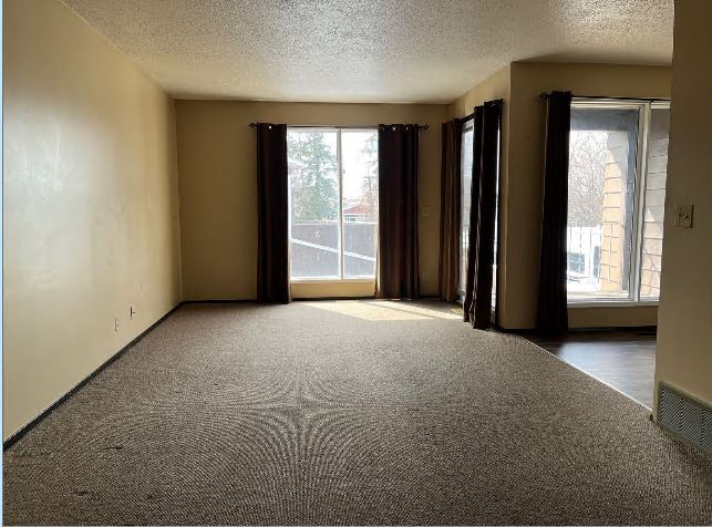 Building Photo - 3 Bed 1.5 Bath Unit in Olds, AB