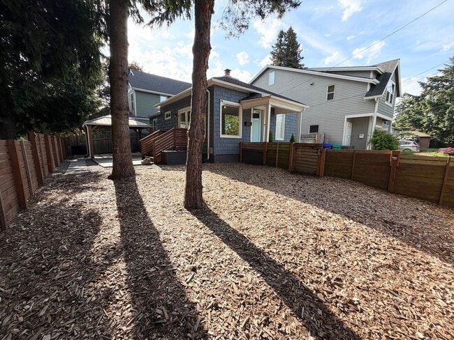 Photo - North PDX Haven: 2bd/1bath Bikeable Bungalow with Huge Covered Patio & Central A/C House