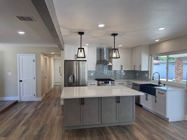 Building Photo - Brand New Remodel – Stunning Pool Home wit...