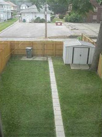 Fenced in, with a shed - 3550 Carrollton Ave