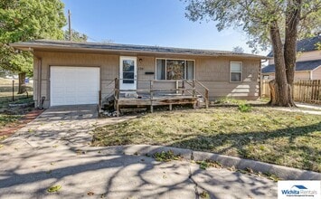 Building Photo - 728 S Dodge Ave