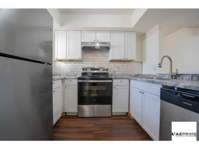 Building Photo - Experience Modern Living in this Remodeled...
