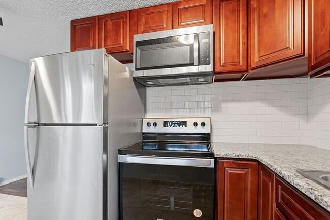 Building Photo - Completely remodeled 3 bedroom unit!! Pets...