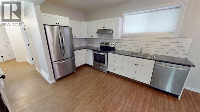 Photo du bâtiment - 11201-11298 98 St