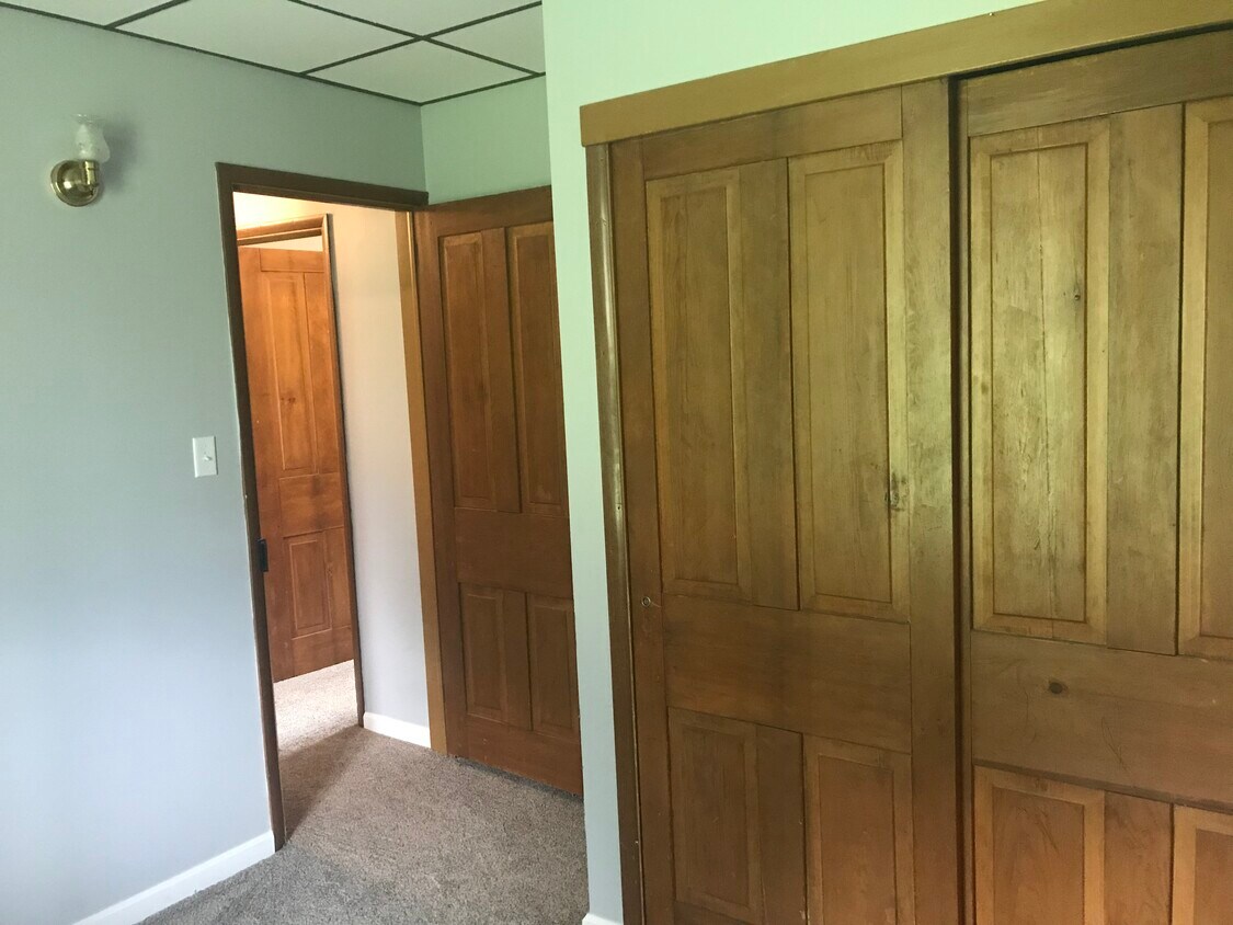 Second bedroom into hallway. - 1353 Irish Creek Rd