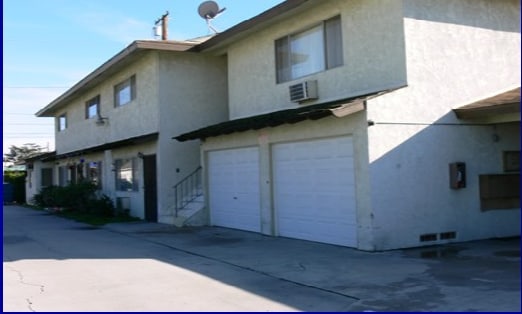 Building Photo - 16443 Woodruff Ave