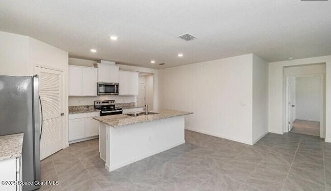 Building Photo - 6935 Topaz Dr