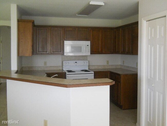 Building Photo - 4 br, 2 bath House - 3018 Wild Turkey Dr.