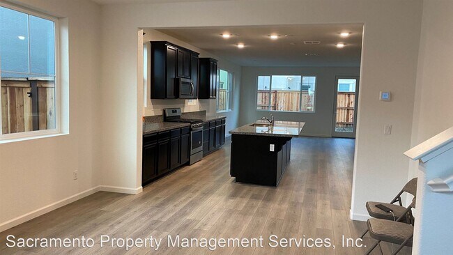 Building Photo - 4 br, 3 bath House - 2458 Buzz Aldrin Way