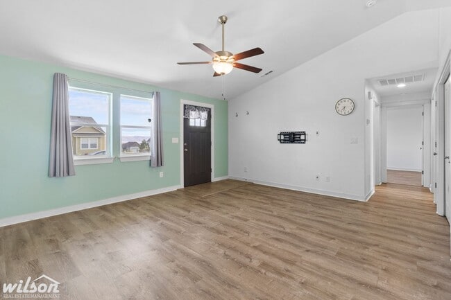 Building Photo - Welcome Home: Big Yard, Garage, and Pets A...