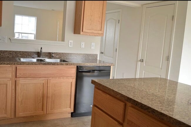 Kitchen with island - 70 Fast View Dr