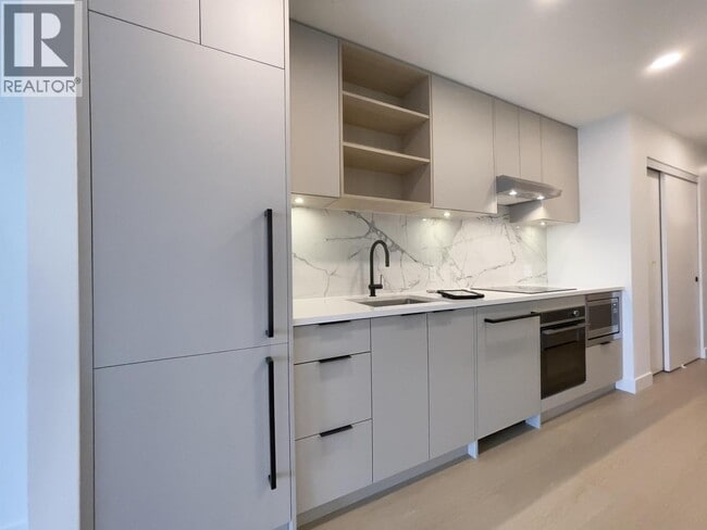 Photo du bâtiment - 402-402 E 3rd St