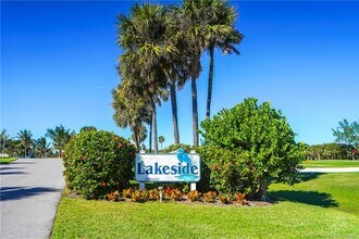 Building Photo - 5532 NE Gulfstream Way Building Photo - 5532 NE Gulfstream Way