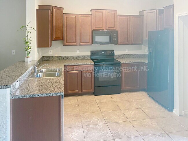 Foto del edificio - 7648 Ginger Lily Ct
