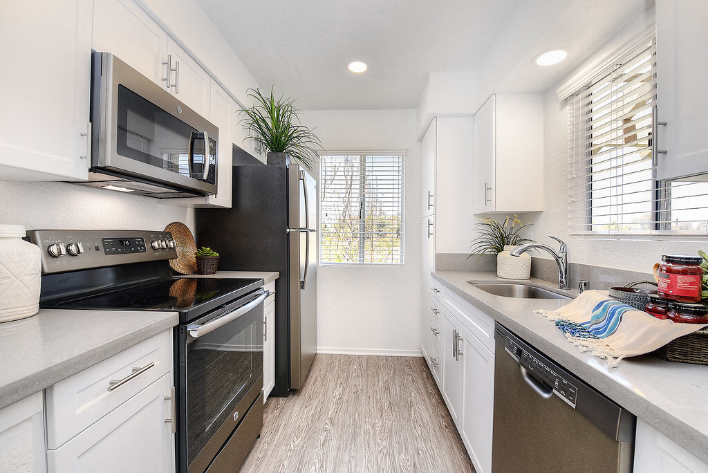 1 Bedroom-Plan B-Beautifully Upgraded Kitchen with Quartz Counters, New Appliances, New Cabinets and Much More! - Bella Vista