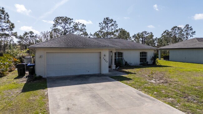 Building Photo - "Charming 3-Bed Oasis with 2 Baths - 1420 ...