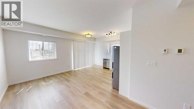 Building Photo - 10101-10105 105 Ave