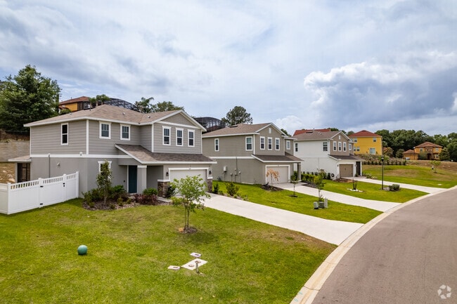 Hillside Neighborhood Which Homes One And Two Story Homes With Attached Garages