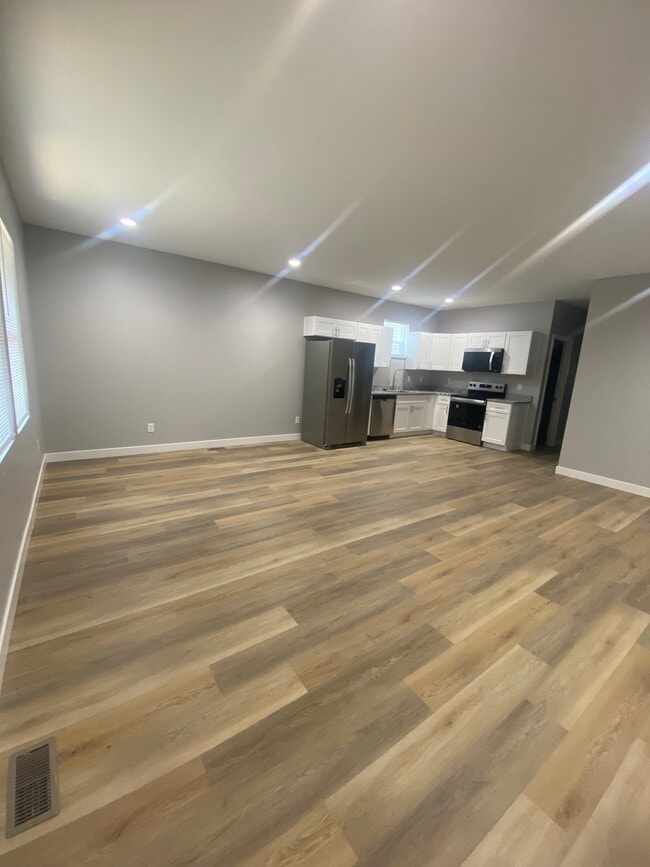 Unit A Living Room and Kitchen - 415 Dequincy St