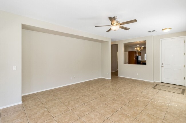 Building Photo - Bright Open Living & a Patio Perfect for Relaxing!