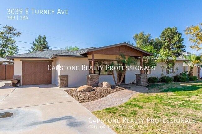 Building Photo - Beautiful 3 bedroom plus den, server area,...
