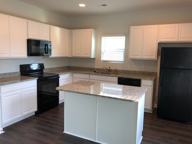 Kitchen with island - 40 Great Bend Dr