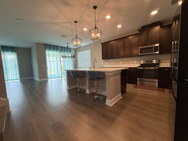 Building Photo - Brand-New 5BR/4BA Rental with Pond View, 4-Car Garage