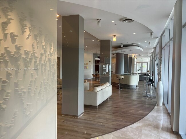 Building Photo - 10275 Collins Ave