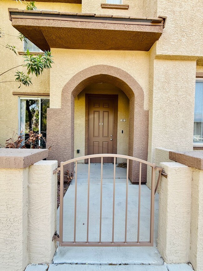Building Photo - Immaculate and Inviting Two-Story Condo in...