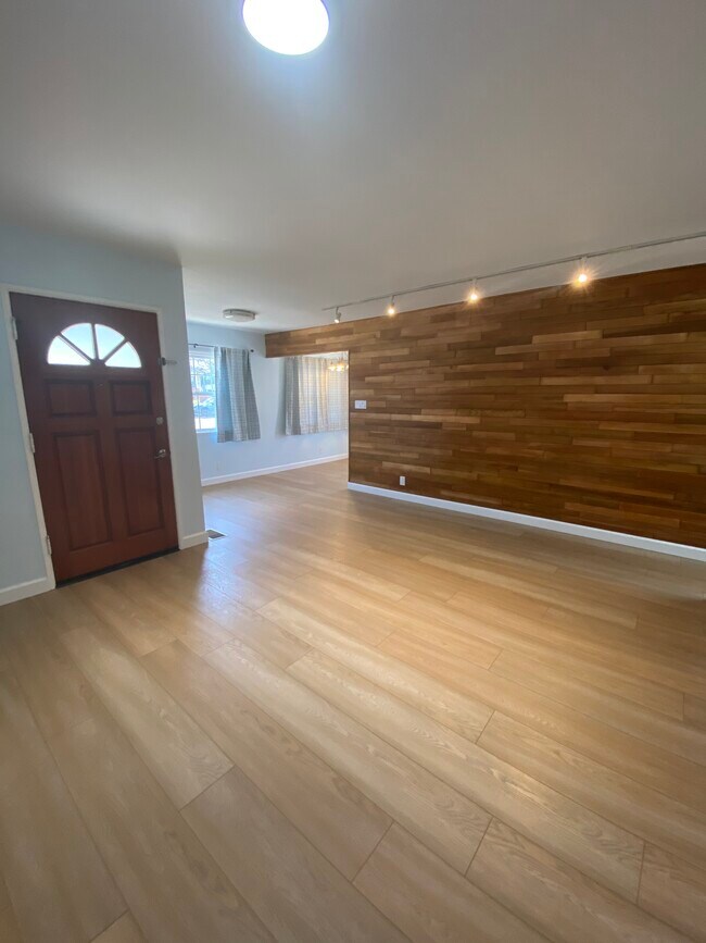 Living room into dining area - 405 N Lucia Ave