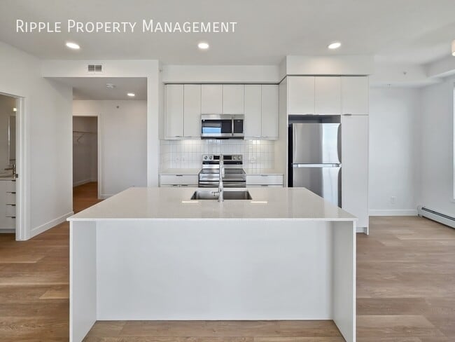 Building Photo - MODERN 2-BED 2-BATH CONDO | BELVEDERE PREMIER LIVING | SLEEK FINISHES