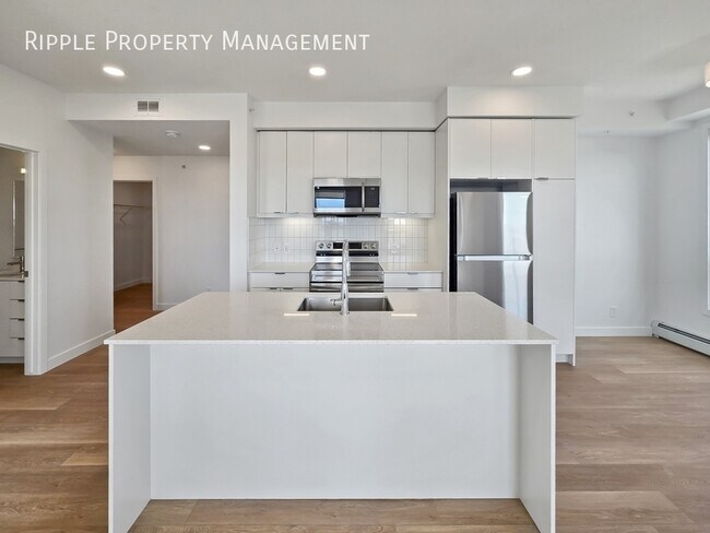 Photo du bâtiment - MODERN 2-BED 2-BATH CONDO | BELVEDERE PREMIER LIVING | SLEEK FINISHES