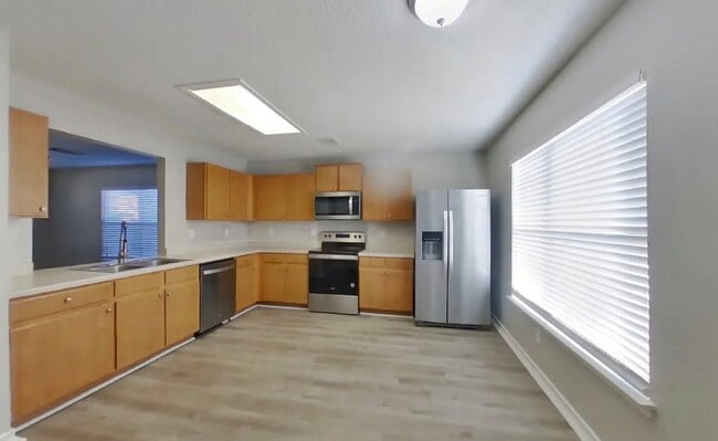 Foto del edificio - Contemporary 4-Bedroom Gem with Open-Plan Design