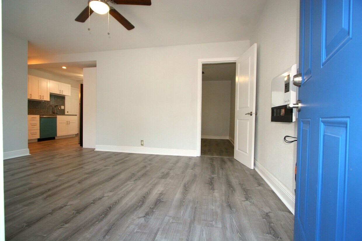 living room, kitchen on left, bedroom straight ahead - 5001 1/2 1st ave N
