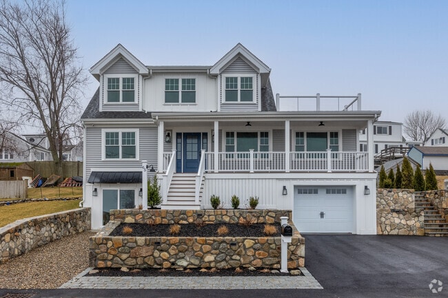 This home takes advantage of a third story for water views in North Weymouth.