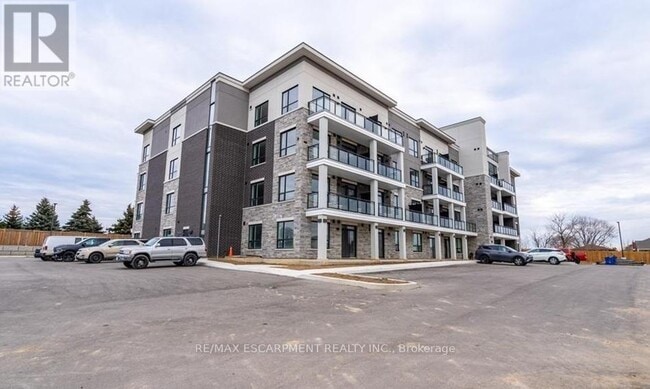 Building Photo - 120-120 Springvalley Crescent